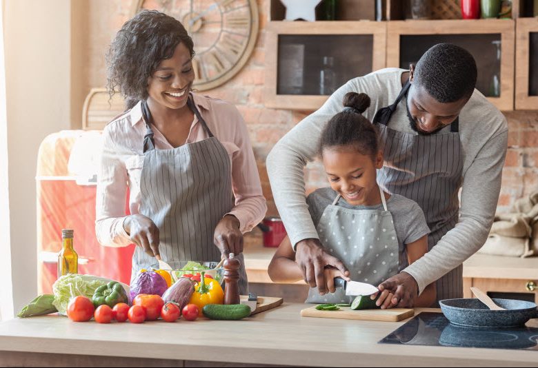 Cairns Paediatric Psychology - Needs of children Happy family preparing food together