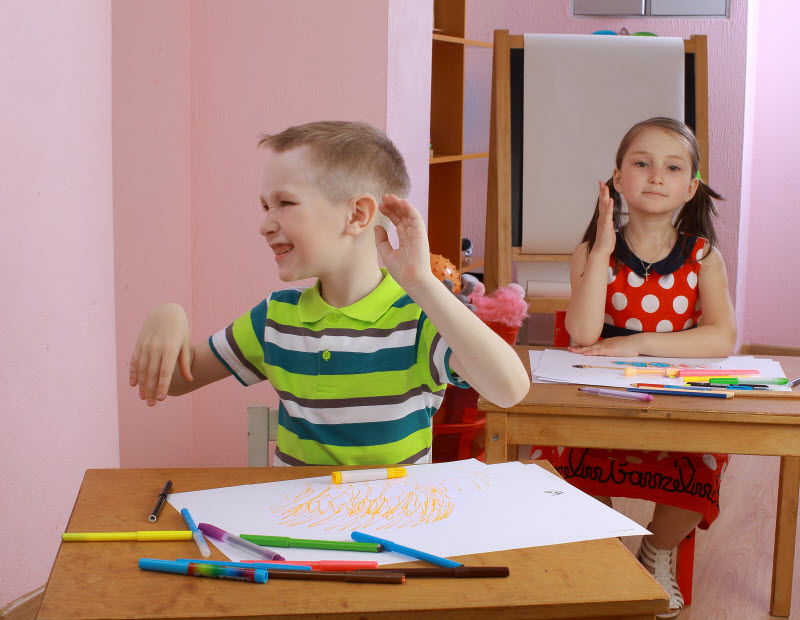 Cairns Paediatric Psychology - Self-esteem Hyperactive boy in a classroom